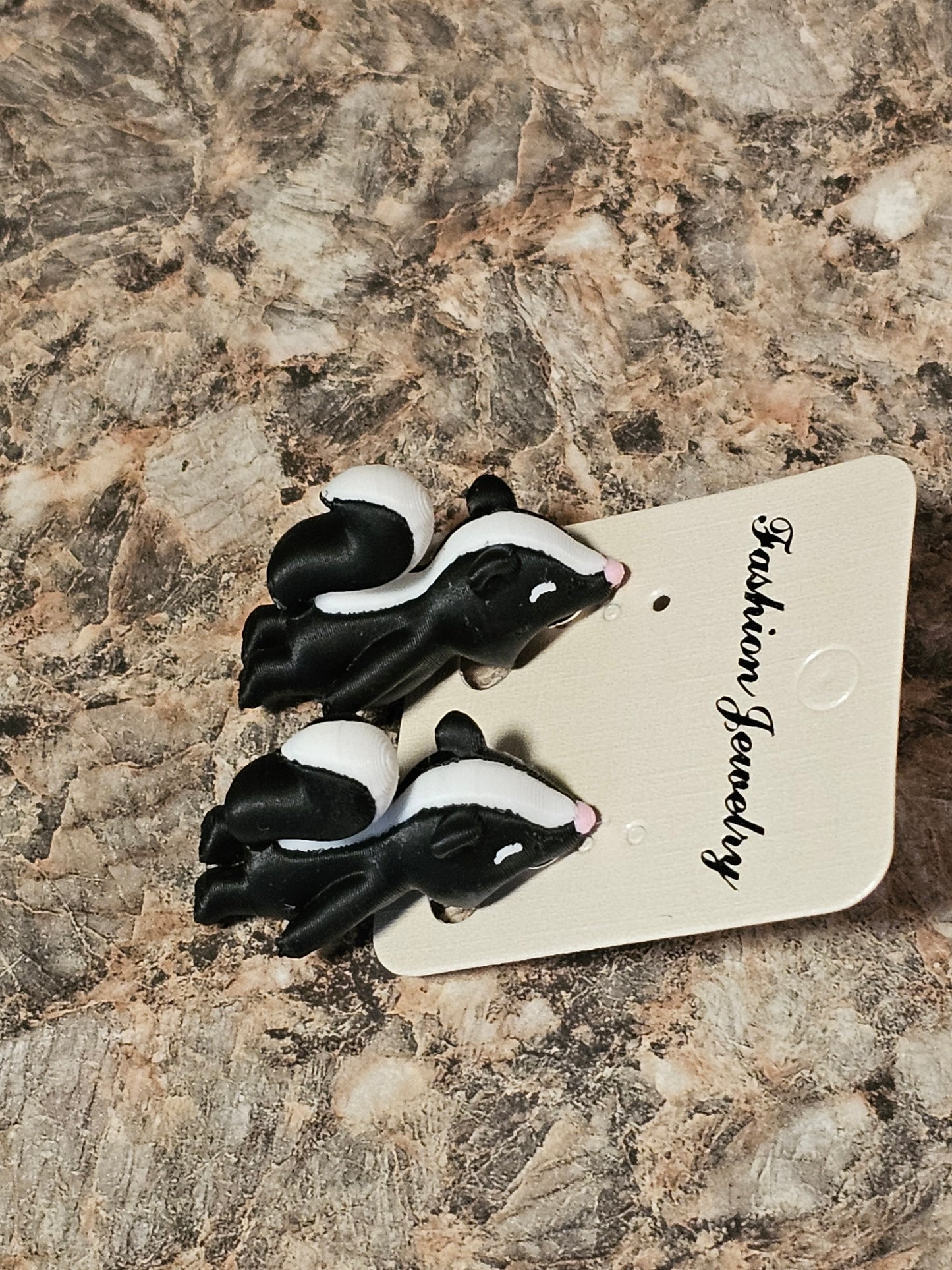 Hungry skunk earrings